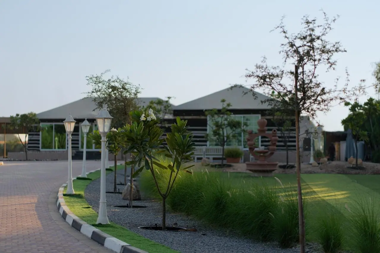SF Lounge villa and lawns at dusk in Ras Al Khaimah